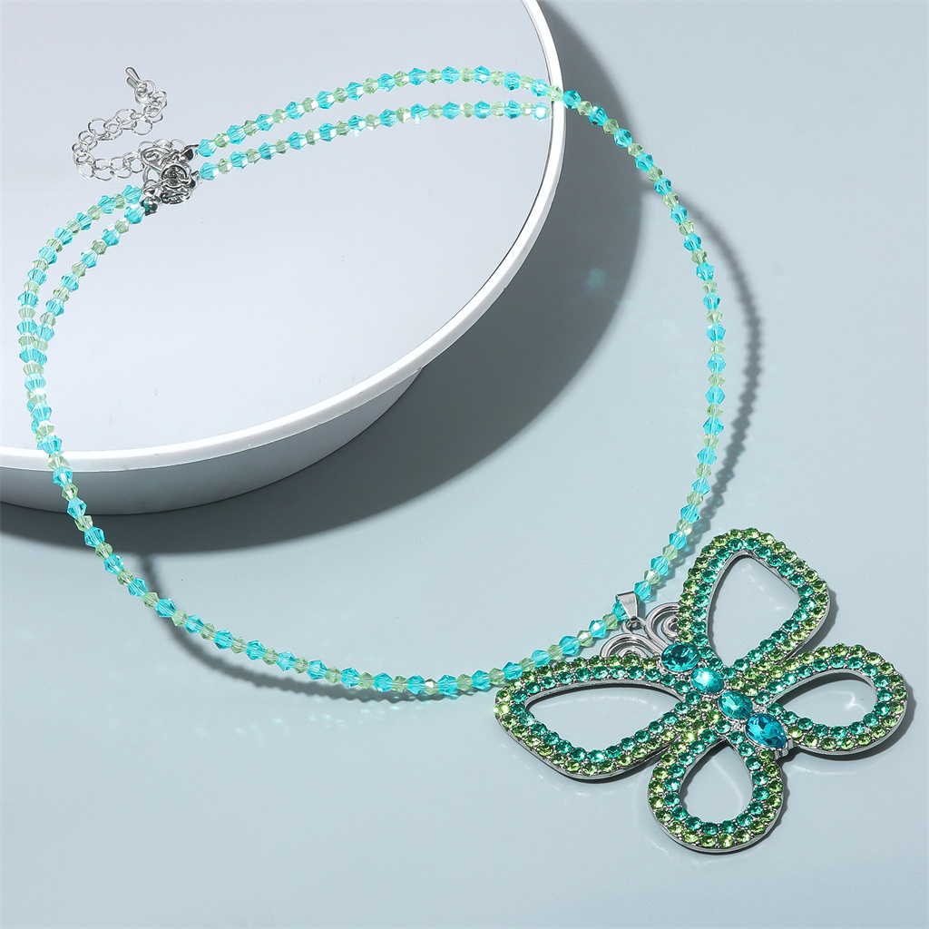 قلادة فراشة مبالغ فيها على طرا - مراجعة Butterfly Pendant Necklace وسعره