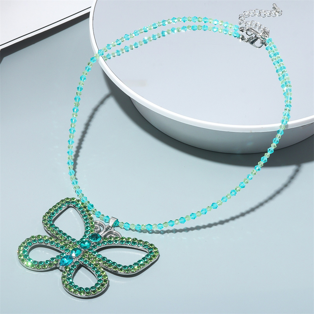 قلادة فراشة مبالغ فيها على طرا - مراجعة Butterfly Pendant Necklace وسعره